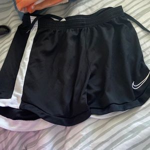 black and white Nike shorts, no liner, small dry fit